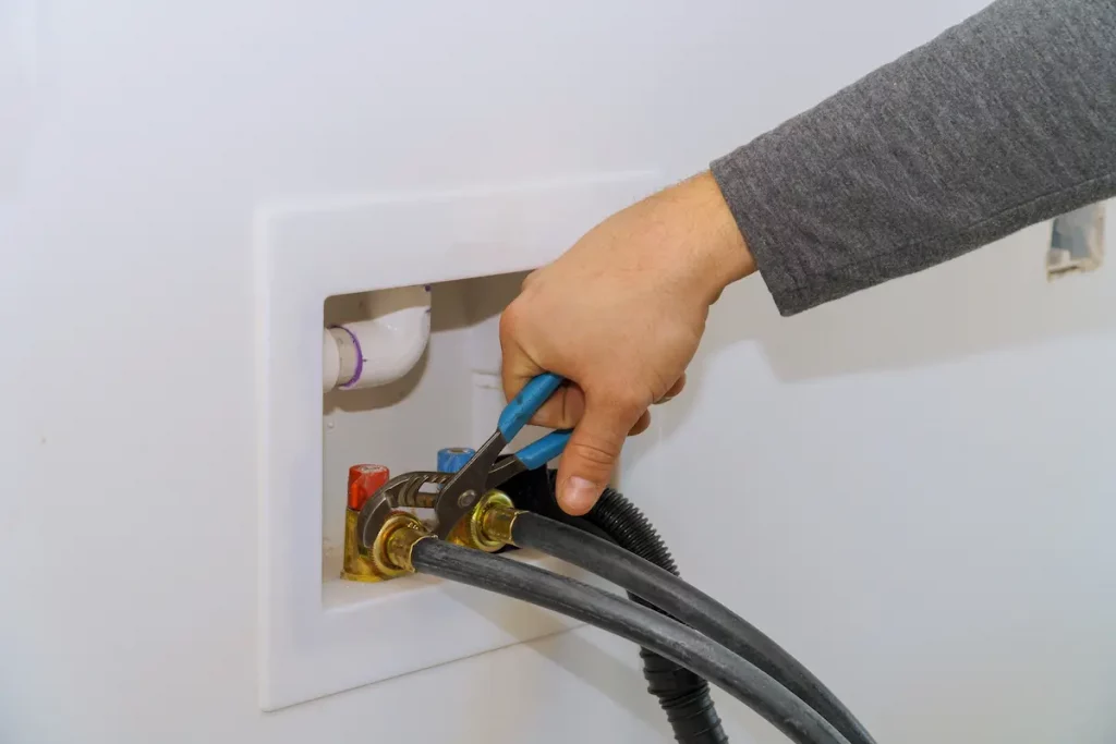 terminando de conectar manguera de lavadora altura desagüe lavadora